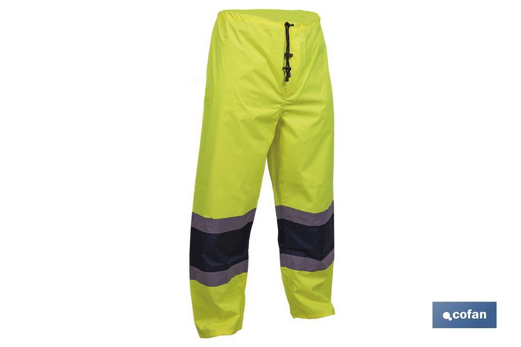 PANTALÓN DE LLUVIA DE ALTA VISIBILIDAD MODELO BELLATRIX AMARILLA Y AZUL TALLA L
